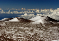 Mauna Kea cinder cones coated in snow. - Pablo McLoud