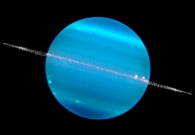 Keck II composite image of Uranus taken on May 28, 2007. The image is comprised of two different types of infrared light, which is invisible to human eyes. The exposures were assigned artificial color to show details in the planet and the rings. The body of planet Uranus appears brighter in one filter (H-band), and the rings appear relatively stronger in the other filter (K-band). - W. M. Keck Observatory (Marcos van Dam)