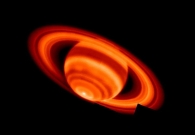 Mosaic false-color image of thermal heat emission from Saturn and its rings taken on February 4, 2004, with the Keck I telescope at 17.65 micron wavelengths. The black square at 4 o’clock represents missing data. - Credit: W.M Keck Observatory/NASA/JPL-G.Orton